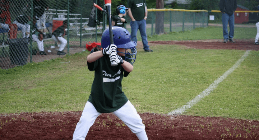 Kid Holding a Baseball Bat